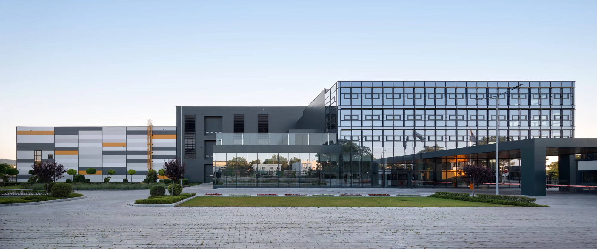 AREON production and administrative complex in Varna – exterior view of the administrative and production buildings by IPA - Architecture and more