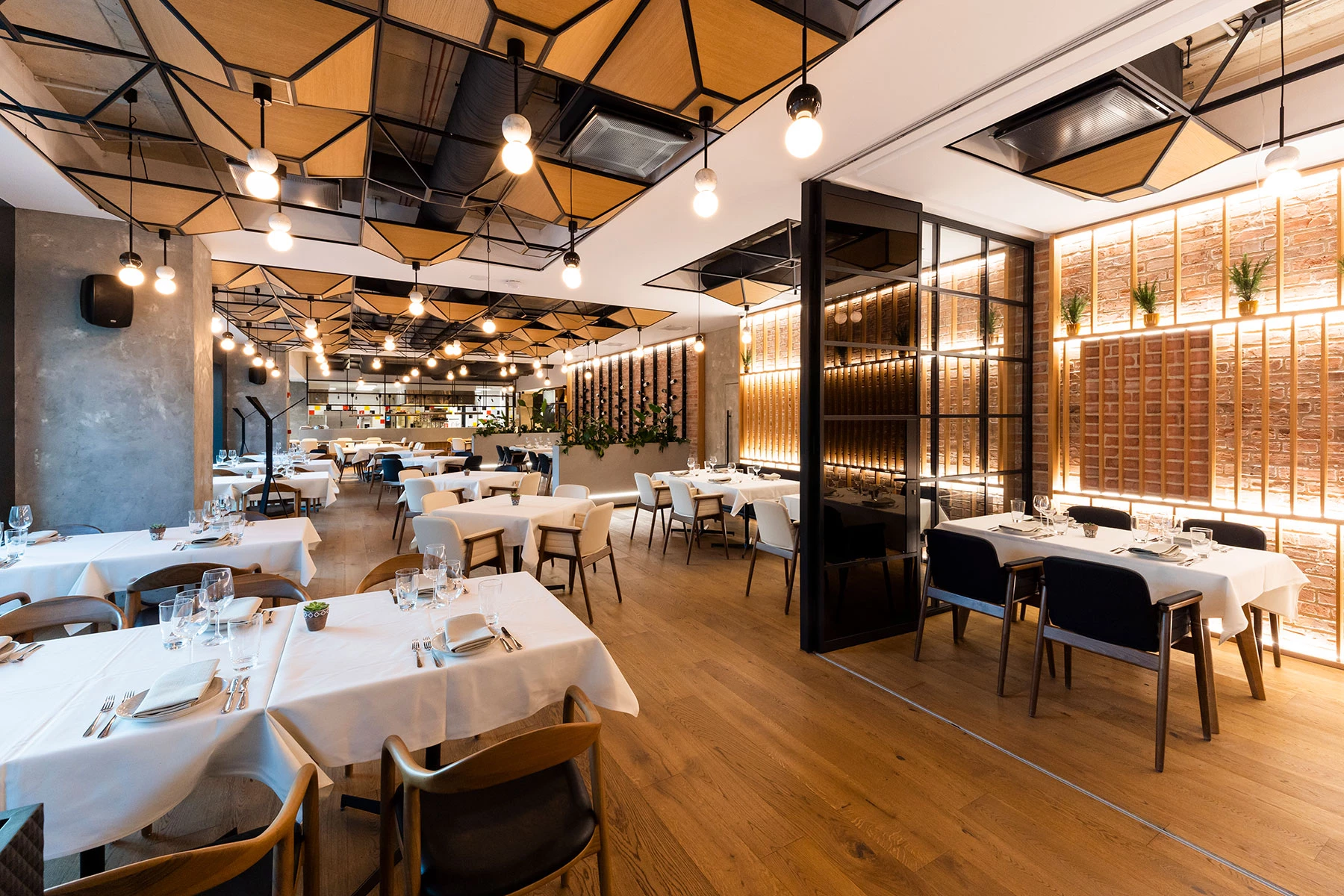 Interior of GORA Restaurant in Sofia with main dining area and wood accents