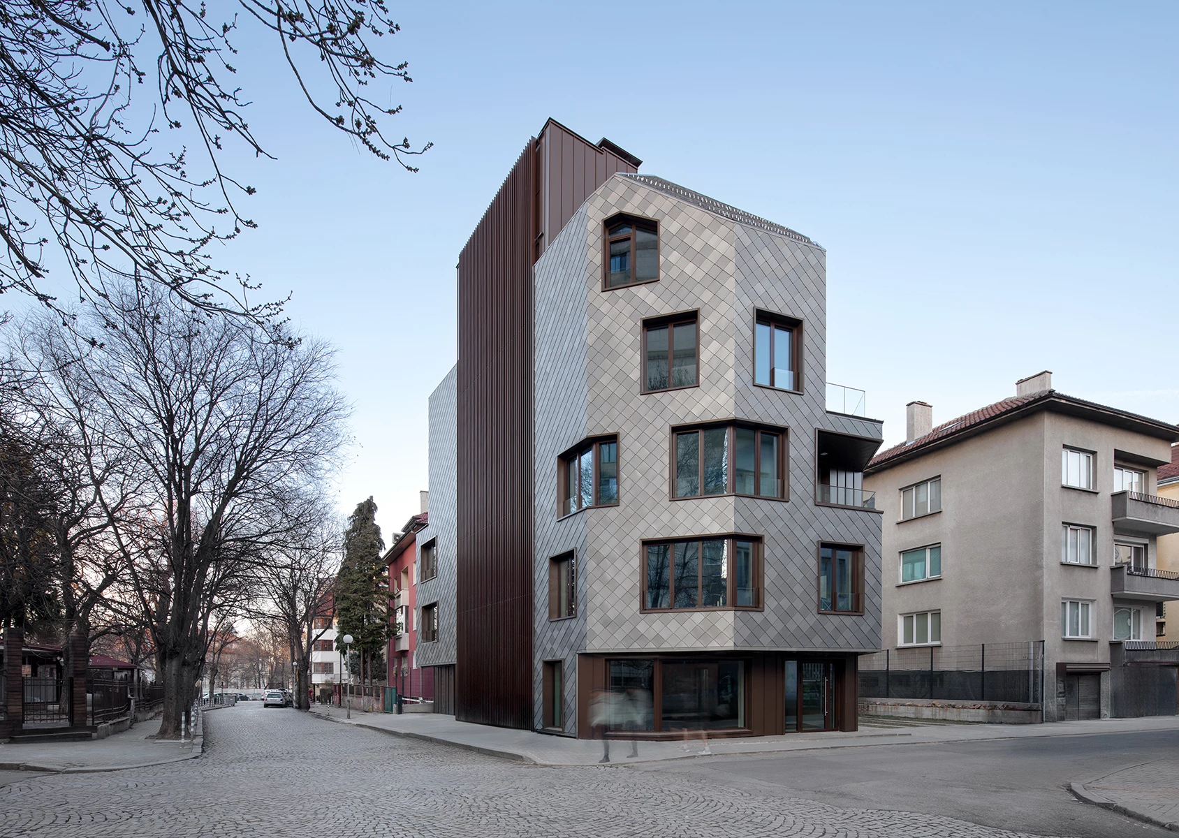 KA11 residential building in Lozenets, Sofia with a titanium-zinc facade and urban surroundings