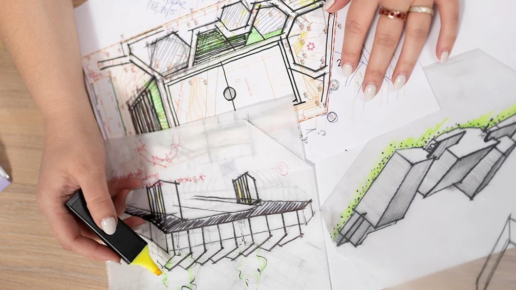 Architectural sketches and concept design options on project drawings