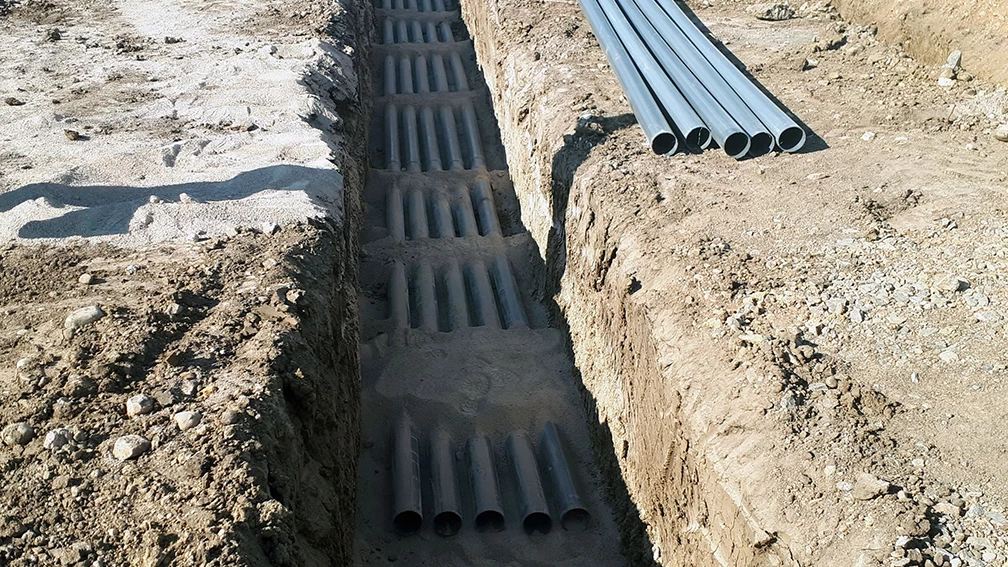 Site utility networks and infrastructure connections to a building