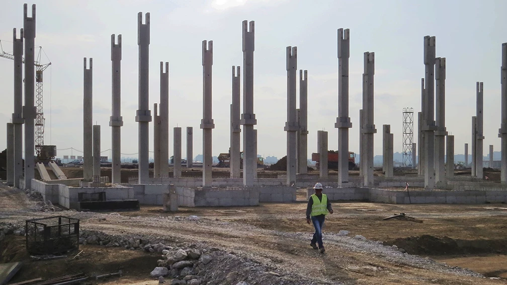 Precast reinforced concrete columns on a construction site