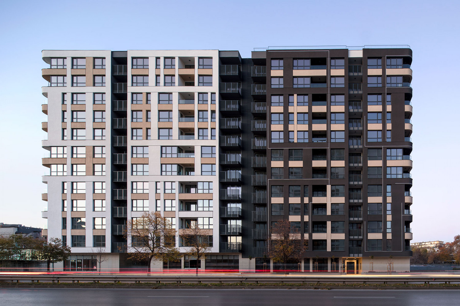 Amur Homes residential building with retail spaces and underground levels