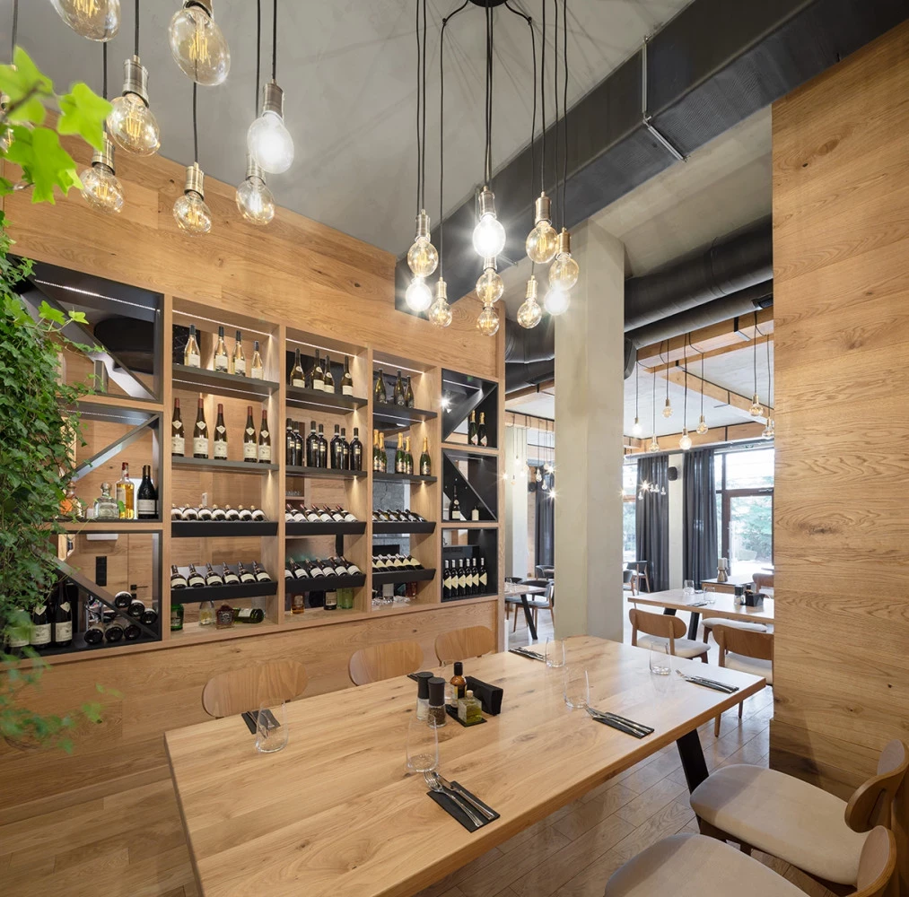 Wood shelving and dining area at Bella Vista restaurant