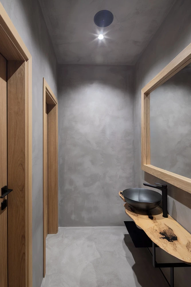 Interior detail at Bella Vista with wood framing and textured wall
