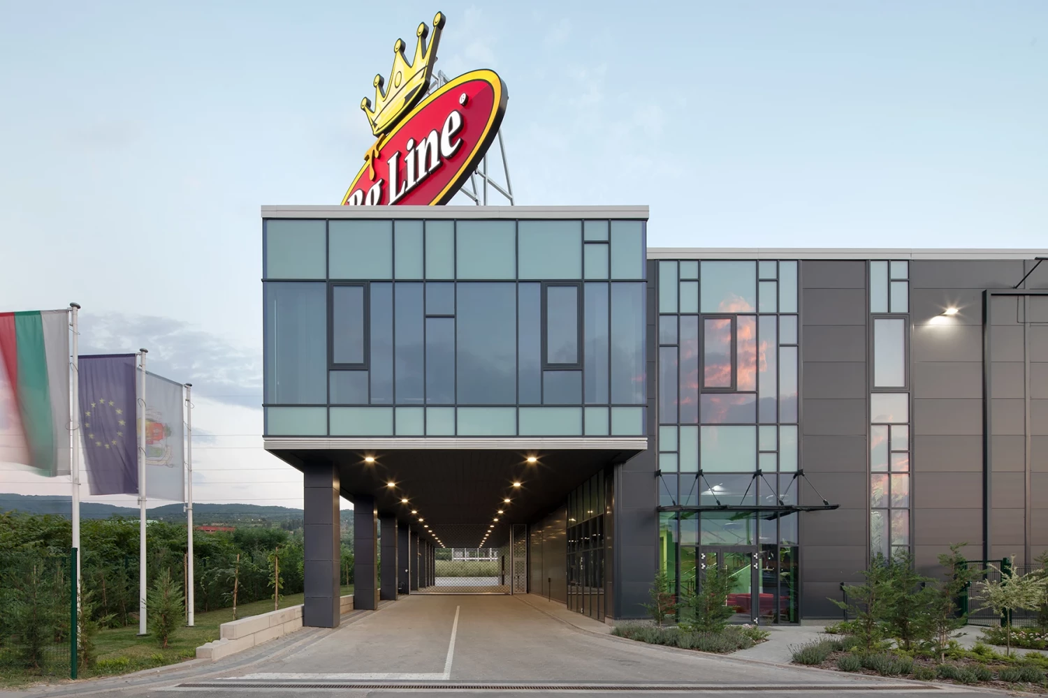 Administrative area of BG Line Logistics Base with glazed facade and elevated volume