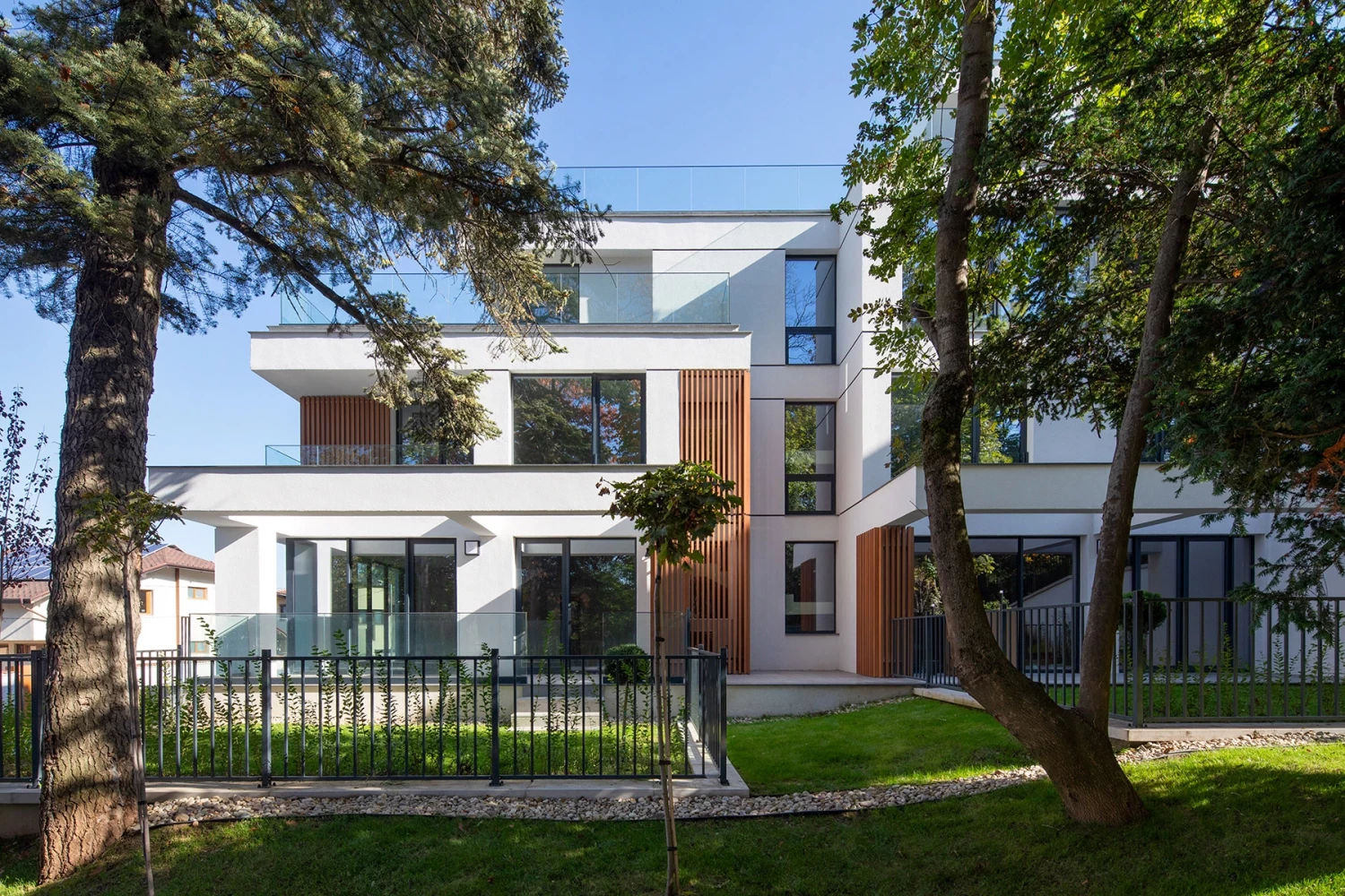 Residential section of Boyana Senses with landscaping and large glazed openings