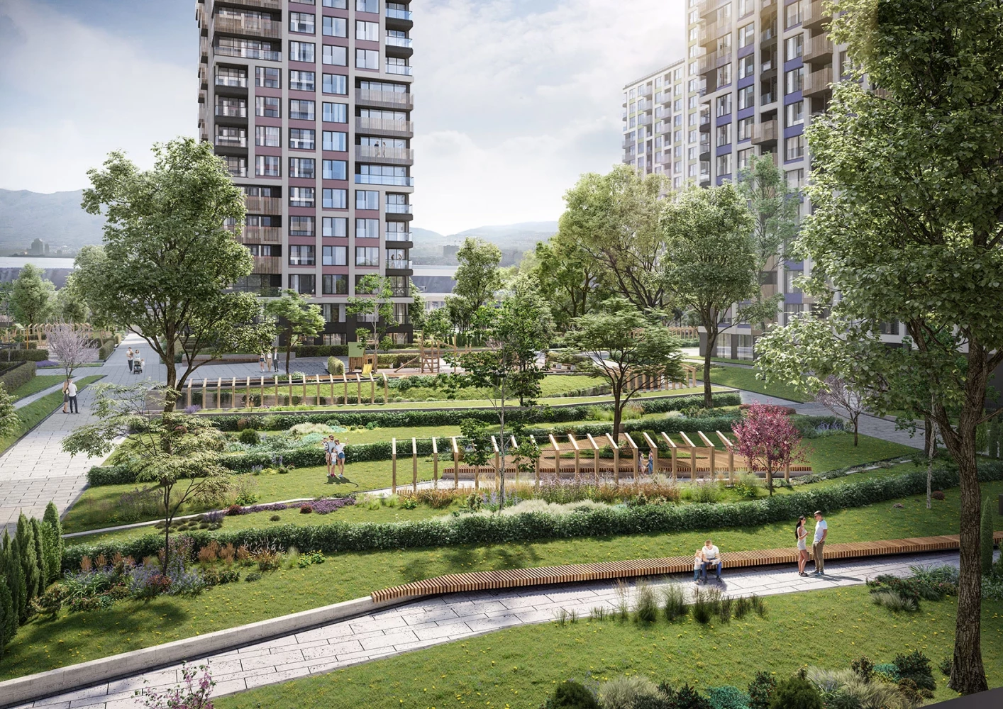 Озеленена градина в Capitol Residence II с пешеходни алеи и жилищни кули на заден план