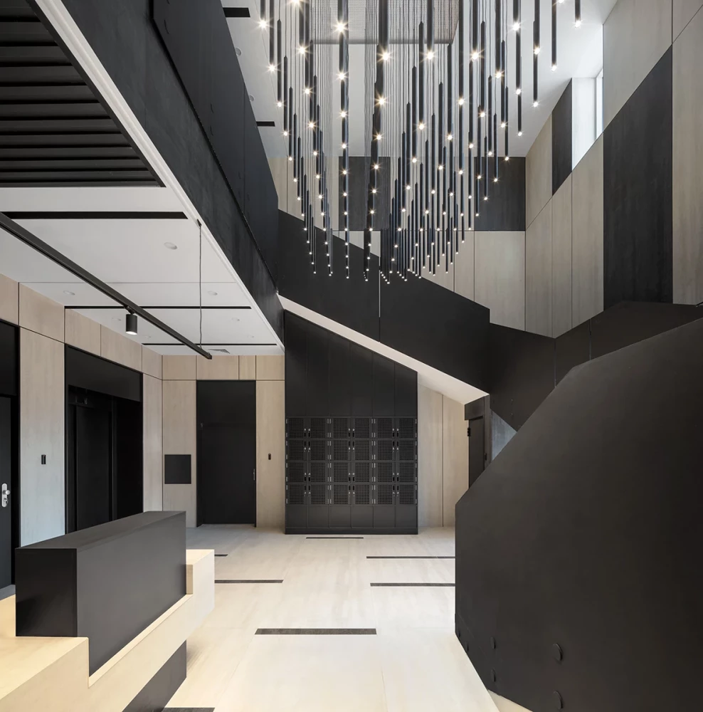 Interior of the CSC entrance lobby with staircase and decorative lighting