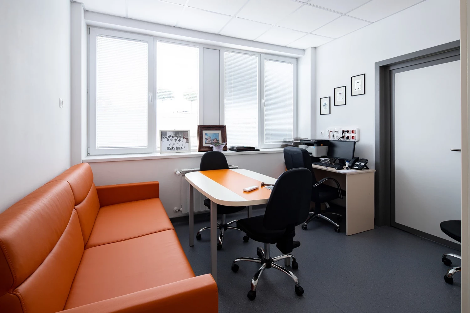 Doctor's office in the new wing of Dr. Stefan Cherkezov Hospital with workstations and seating area