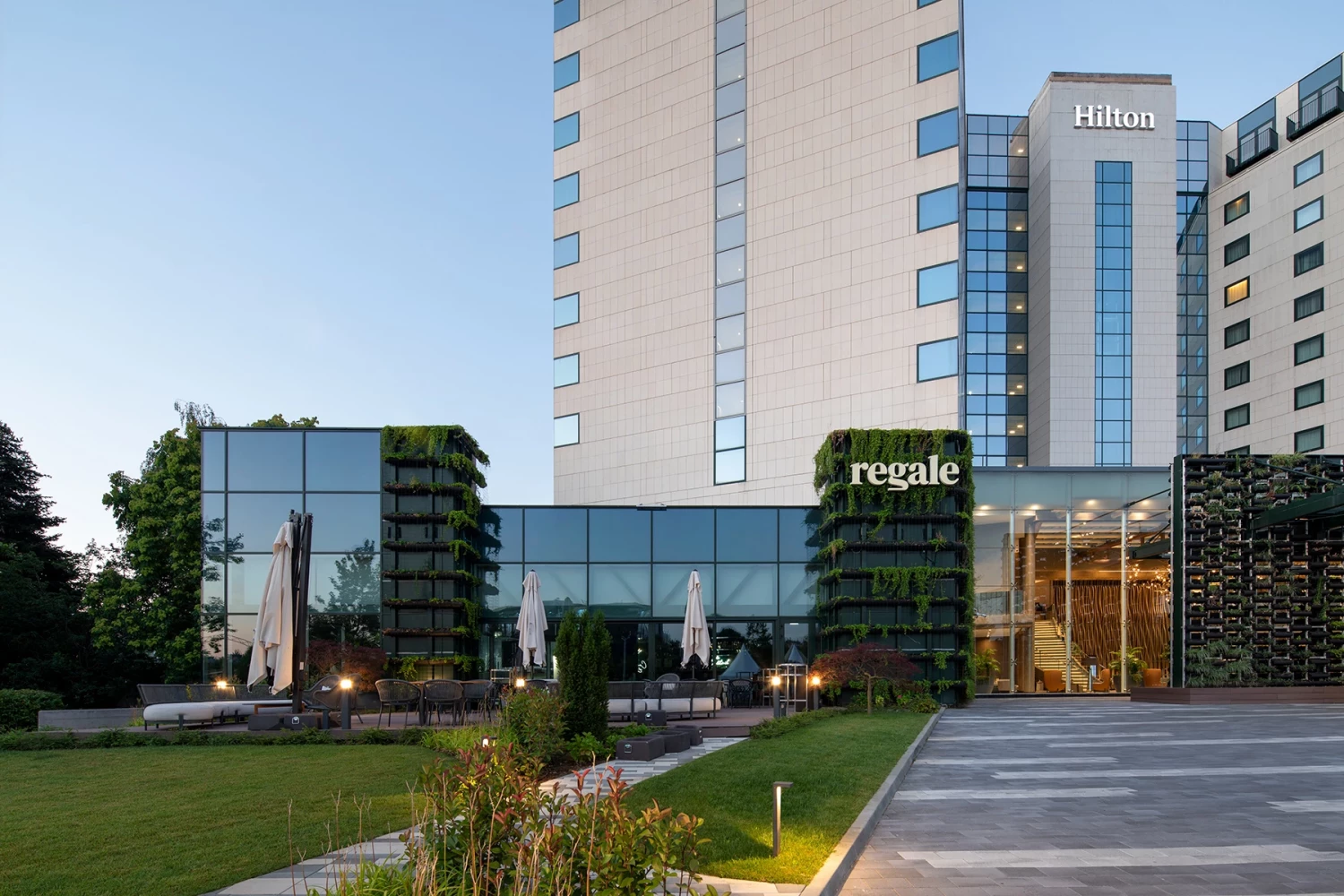 Architectural extension of Hilton Sofia with a glazed facade and vertical green walls