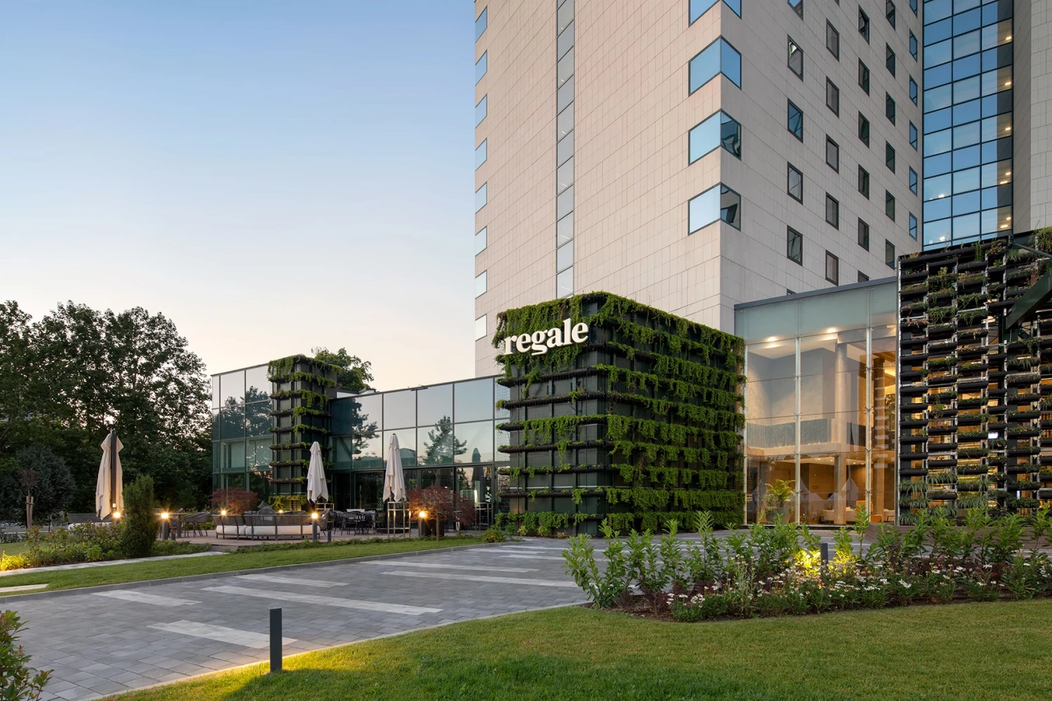 View of the renovated Hilton Sofia with landscaping and new glazed volumes