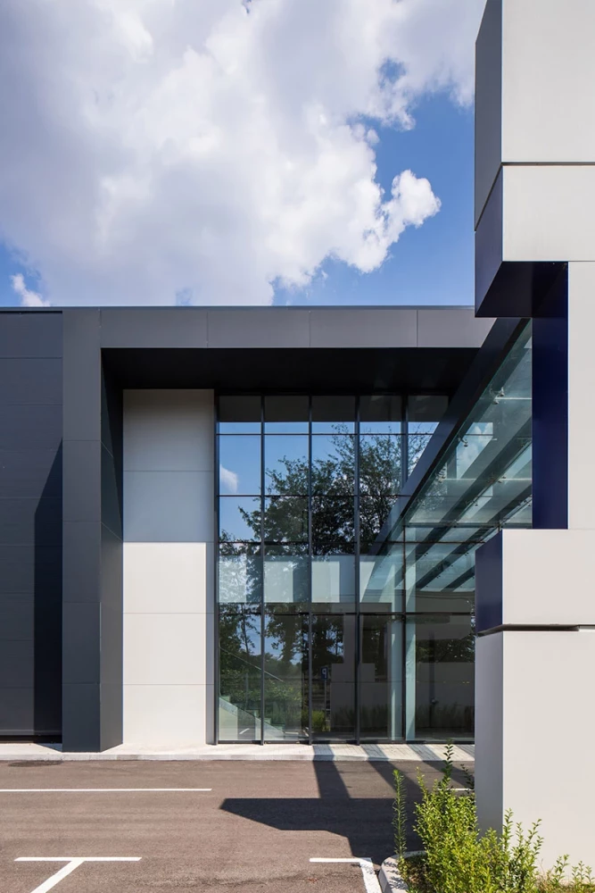 Detail of the main entrance to the IPS Production Complex with glazing and projecting canopy