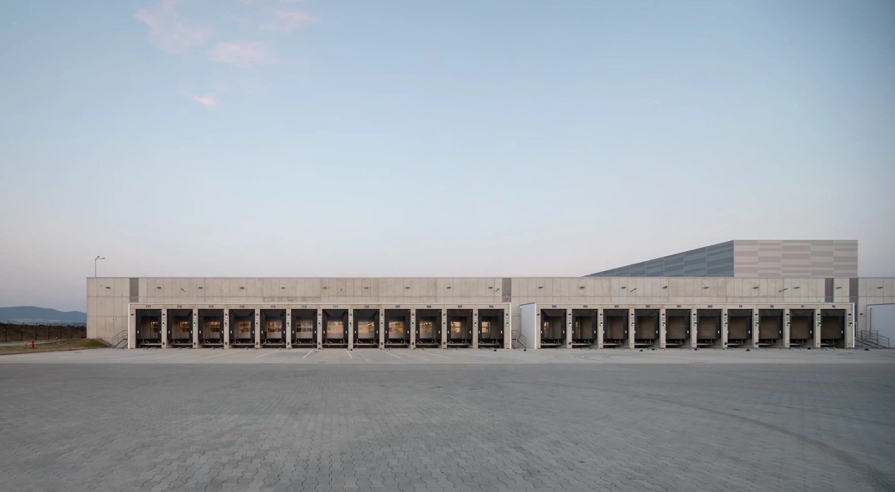 Loading area at the JYSK Logistics Base with a row of truck docks