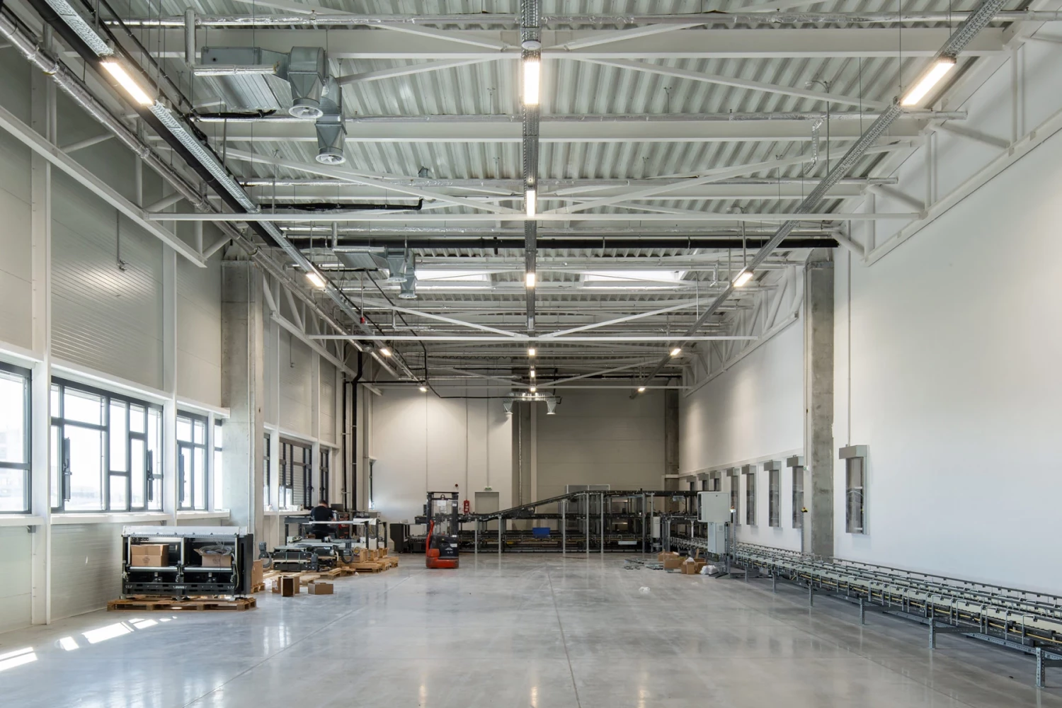 Interior warehouse space at Office 1 Block C with building systems and natural light