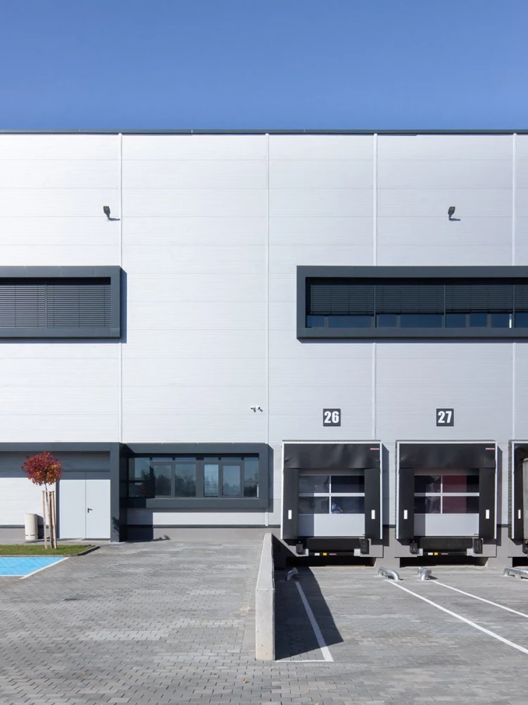 Facade of Office 1 Block C with loading docks and horizontal windows