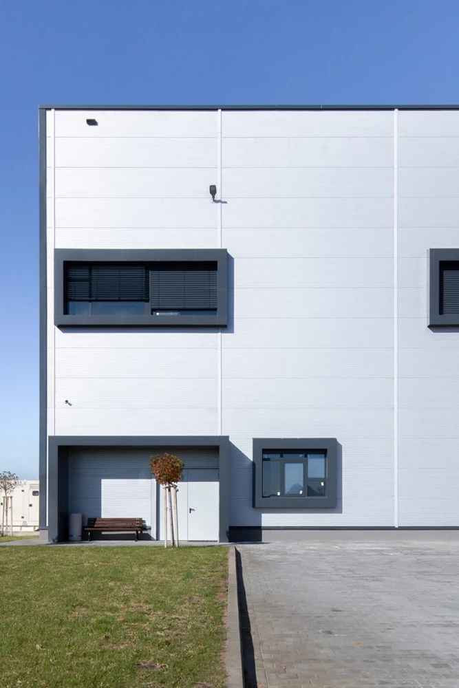 Facade detail of Office 1 Block C with a horizontal window opening