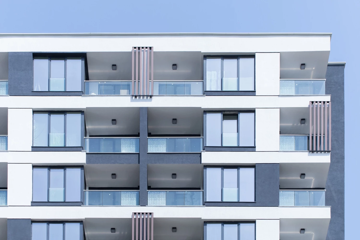 Park View Residence facade with balconies, glazing, and vertical decorative elements