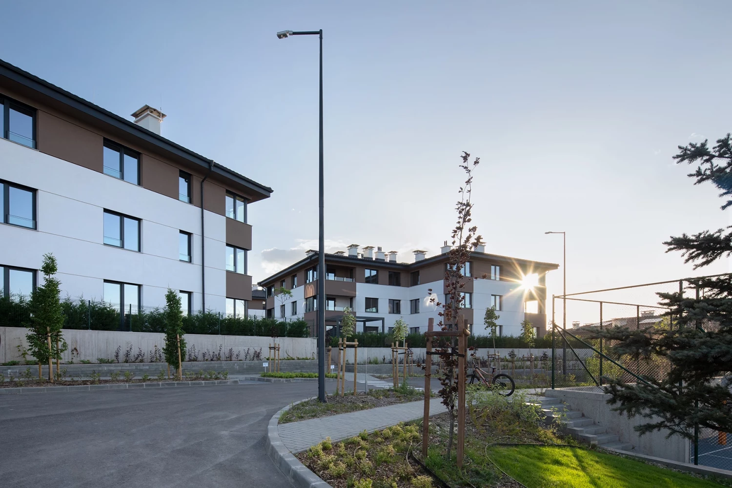 Residential buildings at Residential Park Sofia Phase 3B with pedestrian walkway and landscaping