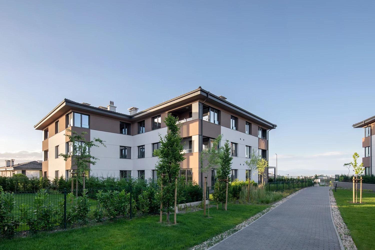 Residential building at Residential Park Sofia Phase 3B with a landscaped pedestrian area