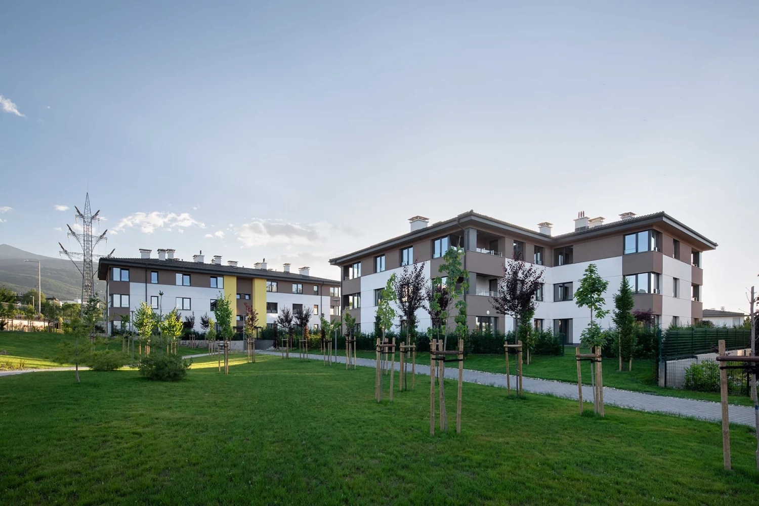 Residential buildings at Residential Park Sofia Phase 3B with lawns and young trees