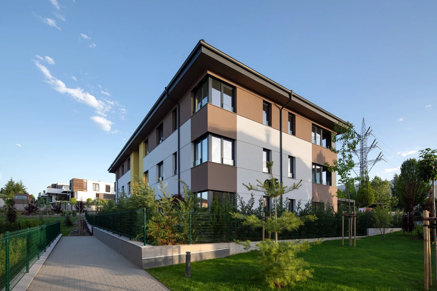Corner view of a residential building at Residential Park Sofia Phase 3B with balconies and landscaping