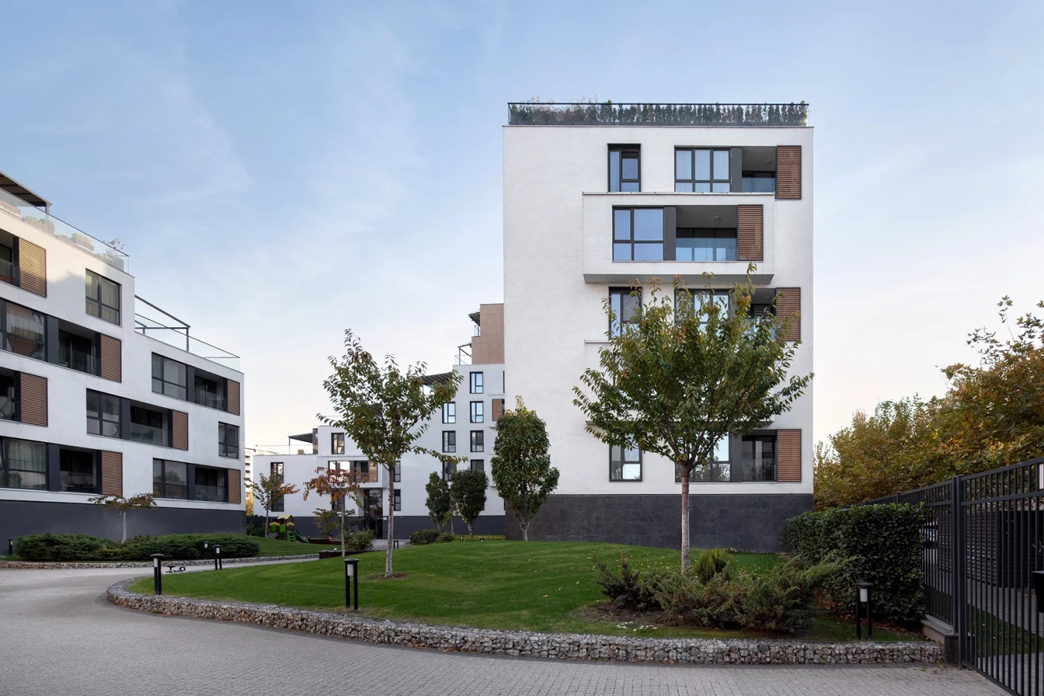 Landscaped area in front of a residential building at Royal Garden in Plovdiv