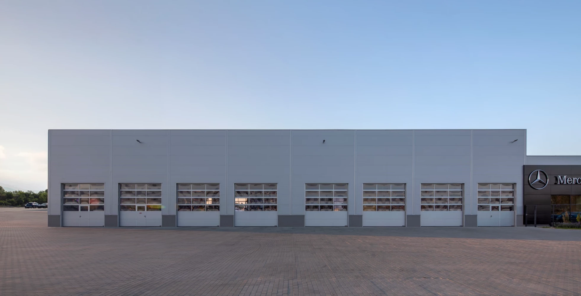 Service building at the Silver Star complex with a row of garage doors