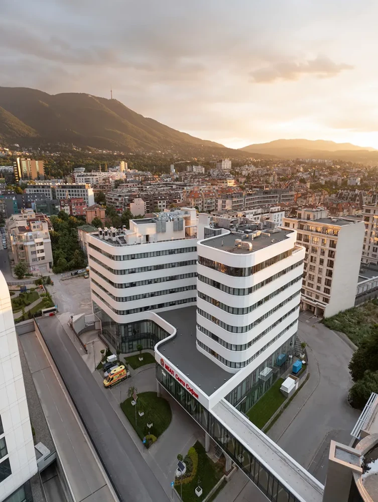 Aerial view of St. Sofia General Hospital within the Sofia urban context and Vitosha Mountain by IPA - Architecture and more