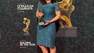 IPA representative holding a Building of the Year 2024 award