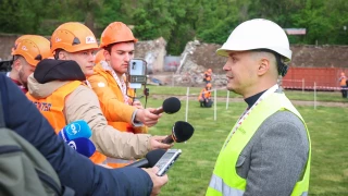 IPA representative speaking to the media at the Bulgarian Army Stadium site