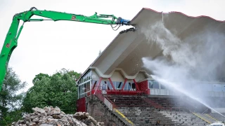 Specialized machinery demolishing the Bulgarian Army Stadium canopy