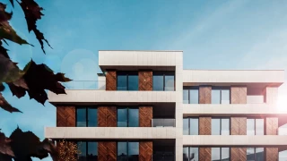 Facade of a residential building at GORA with wood cladding and large windows
