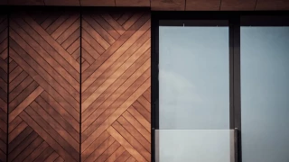 Facade detail at GORA with wood cladding and glazing