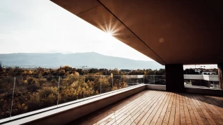 Terrace at GORA with wood decking and panoramic views