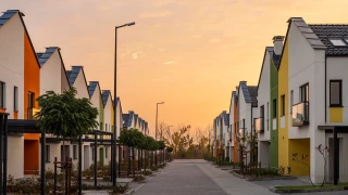 Street between row houses at Residential Park Lozen at sunset
