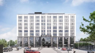 Front visualization of Veliko Tarnovo Business Center with a glazed facade and public ground floor