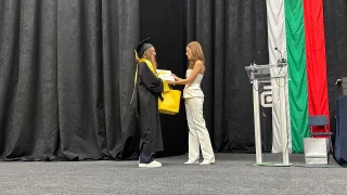 Certificate presentation during the UACEG Class of 2025 graduation ceremony