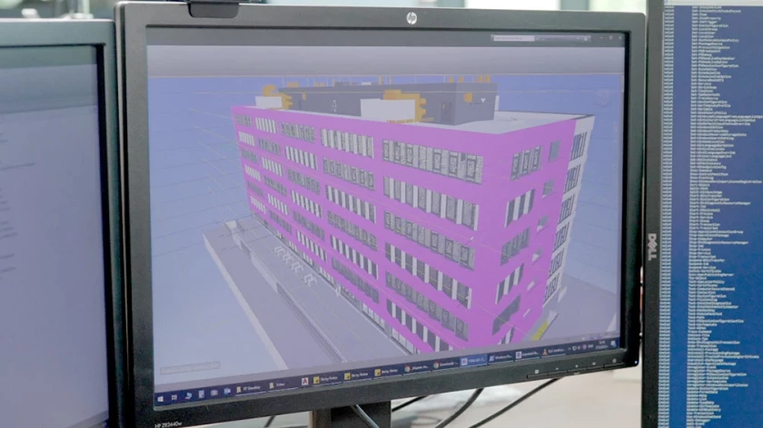 BIM model of a multistory building displayed on a computer monitor